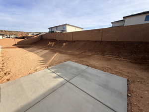 View of fenced backyard