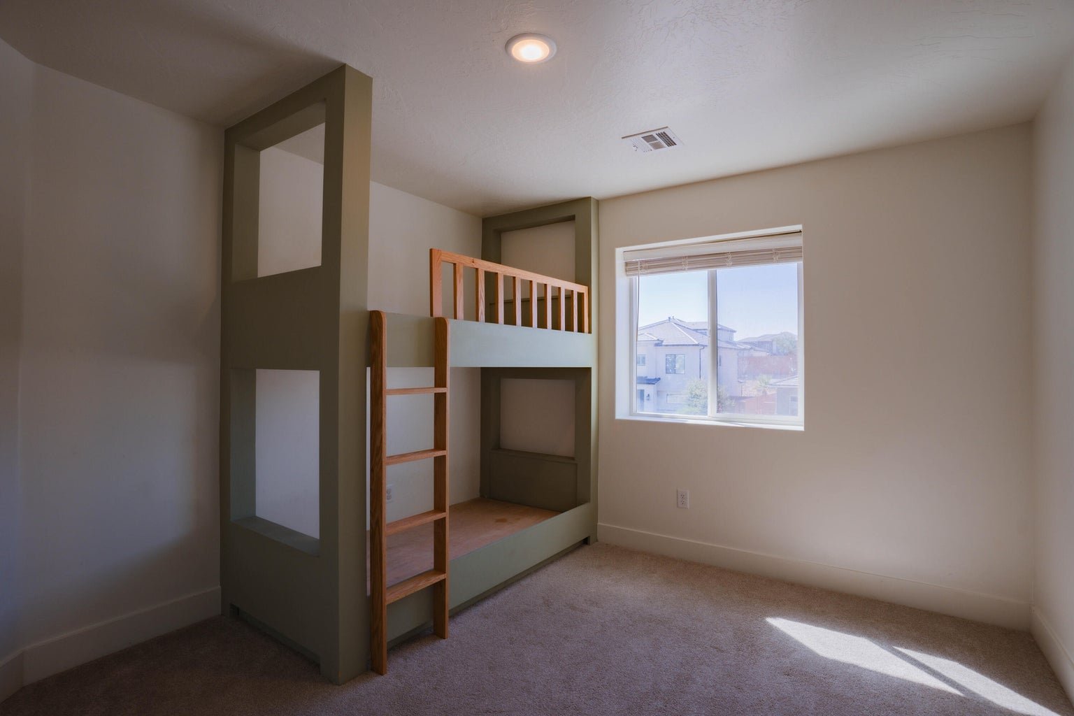 Unfurnished bedroom featuring carpet floors and baseboards