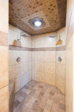 Bathroom with tiled shower