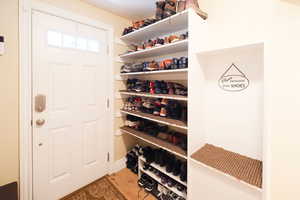 Mudroom with light wood-type flooring