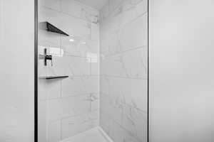 Full bath with a shower stall