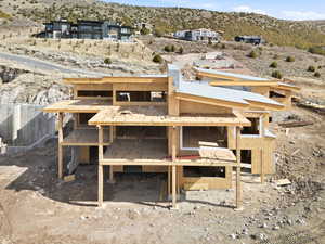 View of yard featuring a mountain view, exterior structure, and an outdoor structure