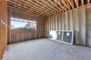 Lower level bedroom with large window