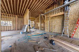 Main level living room with large gas fireplace