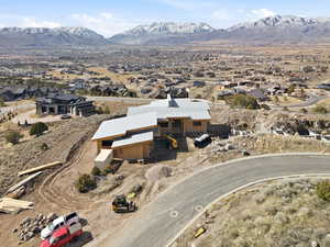 Aerial view of residential area with a mountainous background