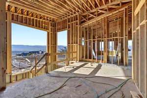 Hallway and stairwell going to lower level