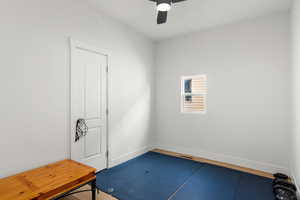 Bedroom featuring baseboards and a ceiling fan