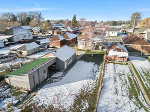 Snowy aerial view with a residential view