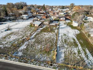 Snowy aerial view with a residential view
