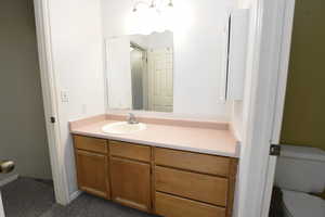 Bathroom featuring toilet and vanity
