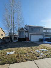 View of front of home with a garage