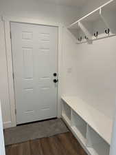 Mudroom featuring dark wood finished floors