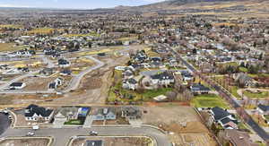 View of property location featuring nearby suburban area and mountains