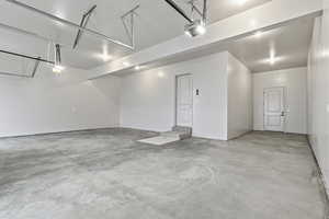 Garage with extended storage area.