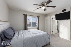 Bedroom with carpet floors and ceiling fan