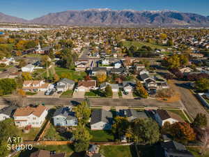 Aerial view of property's location with nearby suburban area