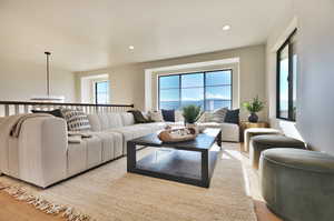 Living room featuring recessed lighting and light wood-style floors