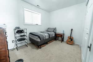 Bedroom with baseboards and a closet
