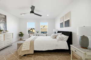 Bedroom featuring carpet flooring, a ceiling fan, and recessed lighting