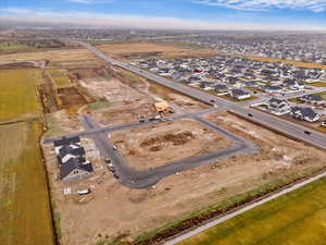 View of property location with nearby suburban area