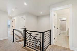 Hallway with an upstairs landing
