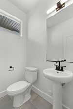 Half Bathroom on side of entryway