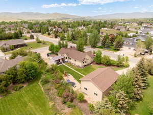 Aerial view of residential area featuring mountains
