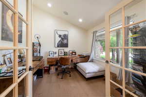 Office featuring vaulted ceiling, light wood-style floors, french doors, and recessed lighting