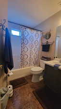 Bathroom with vanity and shower / bath combo