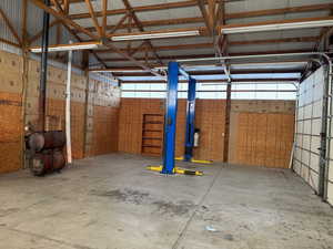 Garage featuring metal wall