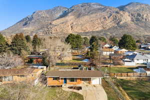 Mountain view featuring nearby suburban area