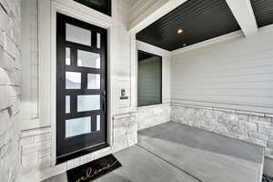 Property entrance featuring a porch