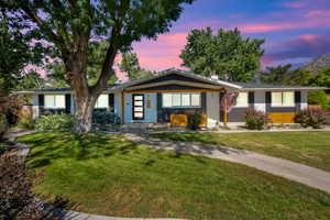 View of front of property featuring a front yard