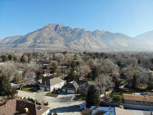 View of mountain backdrop with nearby suburban area
