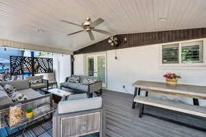 Deck featuring a ceiling fan, an outdoor hangout area, and outdoor dining area