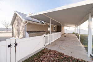 View of patio / terrace with a gate