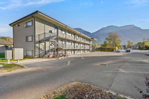 View of road featuring stairs and a mountain view
