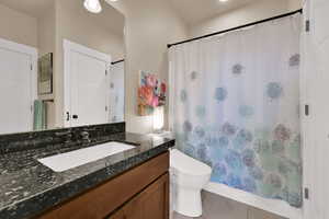 Bathroom featuring vanity and light tile patterned floors
