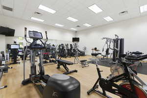 Exercise room featuring a drop ceiling