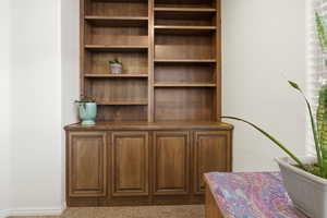 Office featuring dark carpet