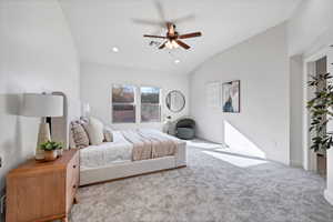 Bedroom featuring carpet floors, a ceiling fan, lofted ceiling, and recessed lighting