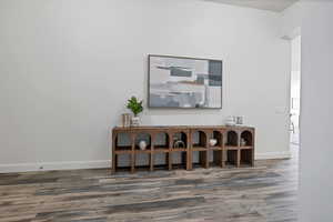 Detailed view of wood finished floors and baseboards