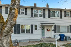 View of front of home with a chimney