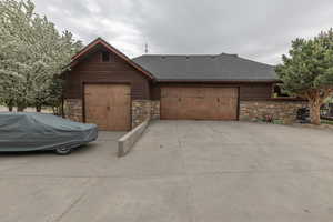Garage with concrete driveway