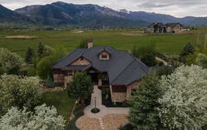Aerial view of sparsely populated area with a mountain backdrop