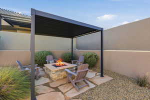 View of patio featuring a pergola