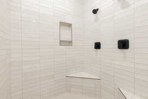Bathroom with tiled shower
