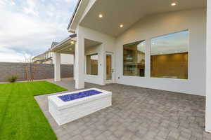 View of patio / terrace featuring an outdoor fire pit