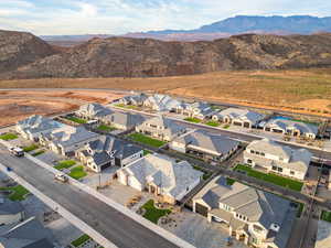 Aerial view of residential area with a mountain backdrop