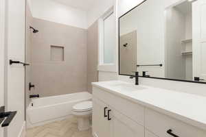 Full bathroom featuring vanity and shower / washtub combination